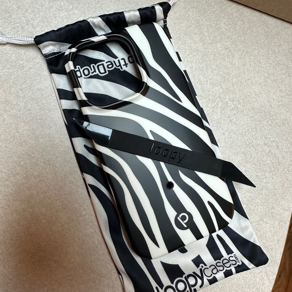 Loopy case - brand new zebra print (retails for $43) for iPhone 14pro (not Max)